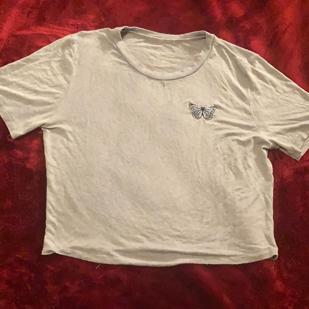 baby blue croptop with little butterfly, originally $11.99 but selling for 6.99.